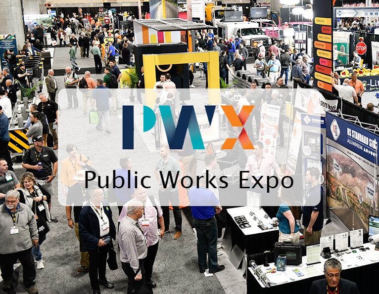 PWX logo on a show floor background