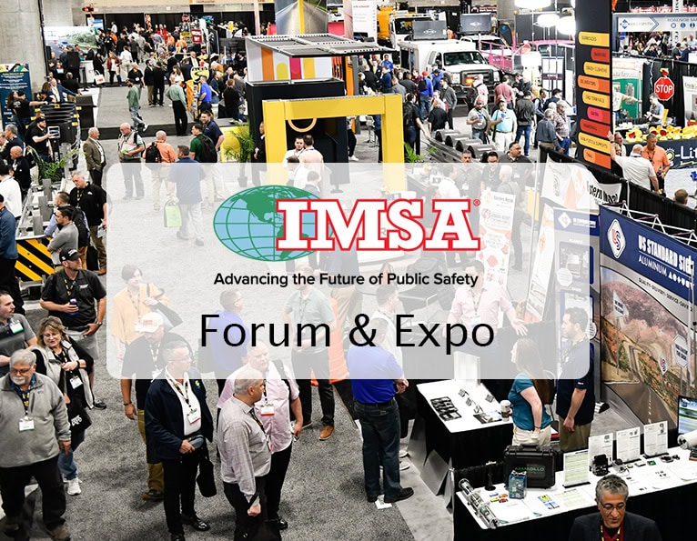 IMSA logo on a show floor background